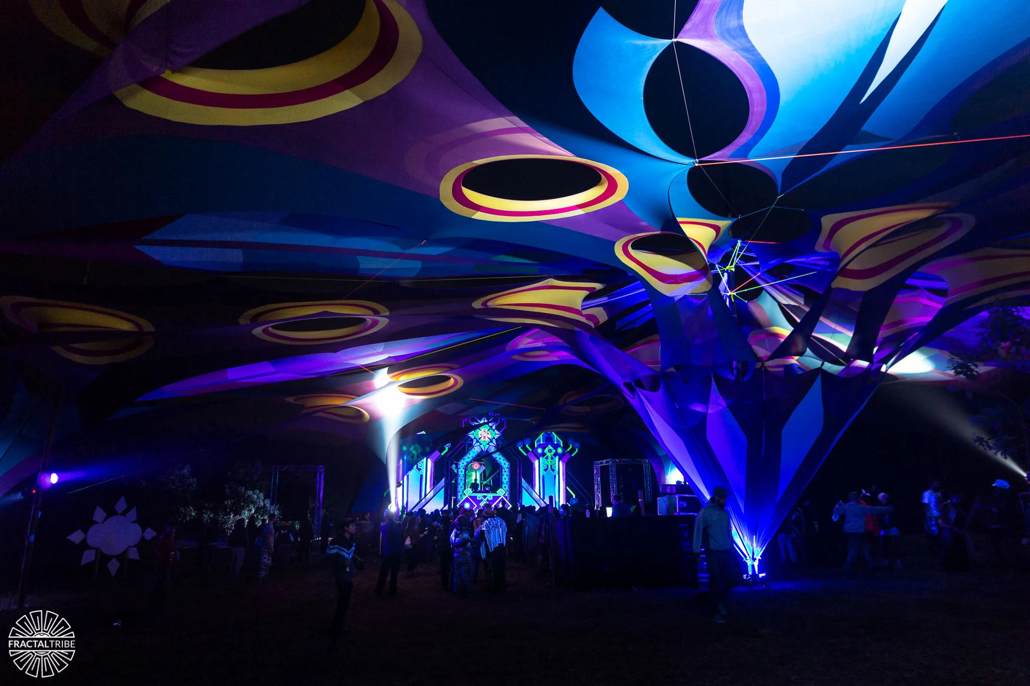 DNA stage canopy at night — UV art